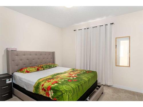 1167 Copperfield Boulevard Se, Calgary, AB - Indoor Photo Showing Bedroom