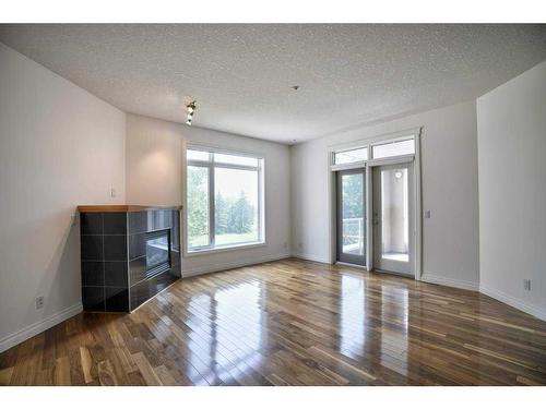 1308-24 Hemlock Crescent Sw, Calgary, AB - Indoor With Fireplace