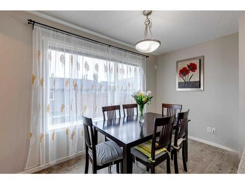 17 Silverado Drive Sw, Calgary, AB - Indoor Photo Showing Dining Room