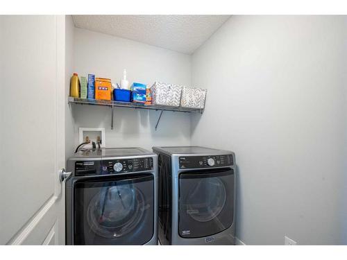 66 Auburn Sound Close Se, Calgary, AB - Indoor Photo Showing Laundry Room