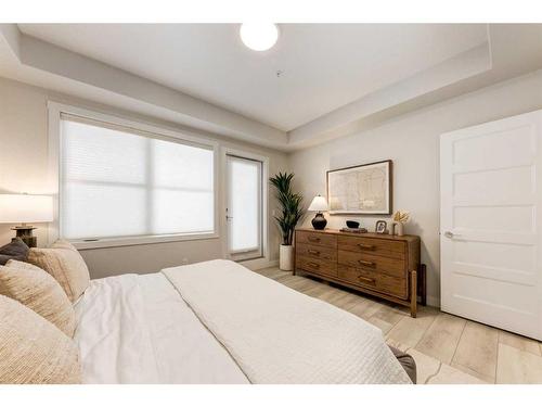 102-55 Wolf Hollow Crescent Se, Calgary, AB - Indoor Photo Showing Bedroom