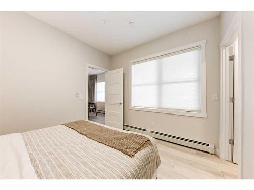 102-55 Wolf Hollow Crescent Se, Calgary, AB - Indoor Photo Showing Bedroom