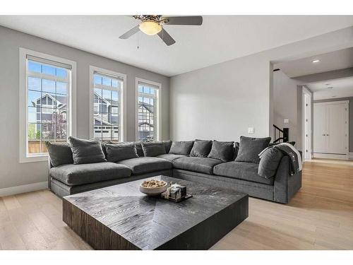 205 Kinniburgh Circle, Chestermere, AB - Indoor Photo Showing Living Room