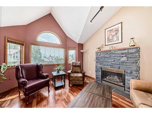 308 Canyon Close, Canmore, AB - Indoor Photo Showing Living Room With Fireplace