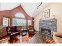 308 Canyon Close, Canmore, AB  - Indoor Photo Showing Living Room With Fireplace 