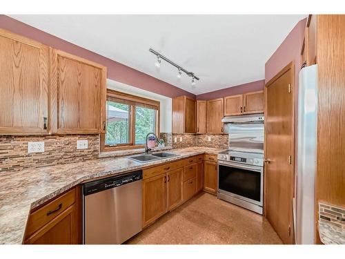 308 Canyon Close, Canmore, AB - Indoor Photo Showing Kitchen With Double Sink