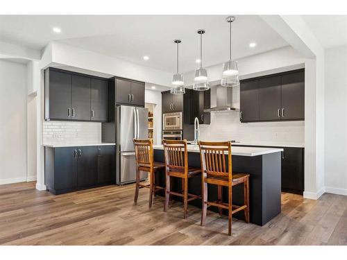 20 Willow Park Point, Cochrane, AB - Indoor Photo Showing Kitchen With Upgraded Kitchen