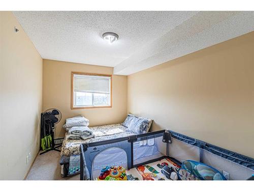 308-92 Saddletree Court Ne, Calgary, AB - Indoor Photo Showing Bedroom