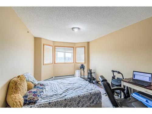 308-92 Saddletree Court Ne, Calgary, AB - Indoor Photo Showing Bedroom