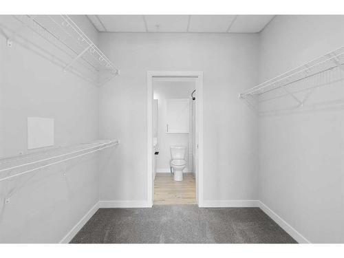 413-255 Les Jardins Park Se, Calgary, AB - Indoor With Storage