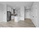 413-255 Les Jardins Park Se, Calgary, AB  - Indoor Photo Showing Kitchen 