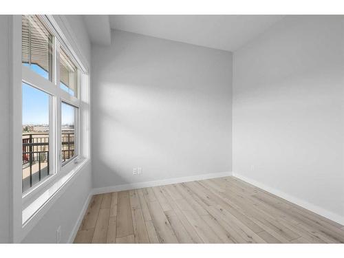 413-255 Les Jardins Park Se, Calgary, AB - Indoor Photo Showing Other Room