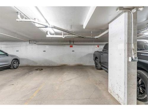 2401-60 Panatella Street, Calgary, AB - Indoor Photo Showing Garage