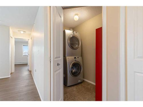 2401-60 Panatella Street Nw, Calgary, AB - Indoor Photo Showing Laundry Room