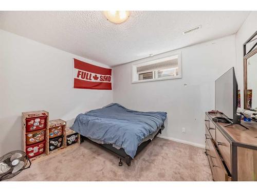 56 Reunion Close Nw, Airdrie, AB - Indoor Photo Showing Bedroom