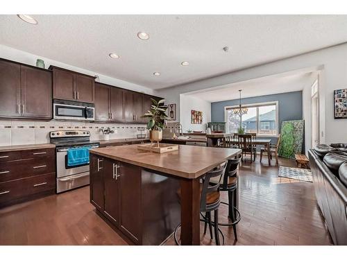 56 Reunion Close Nw, Airdrie, AB - Indoor Photo Showing Kitchen With Double Sink