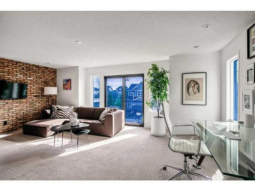 190 Auburn Shores Crescent Se, Calgary, AB - Indoor Photo Showing Living Room With Fireplace