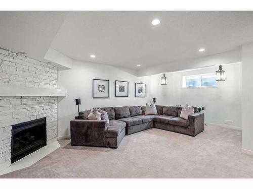 190 Auburn Shores Crescent Se, Calgary, AB - Indoor Photo Showing Living Room With Fireplace