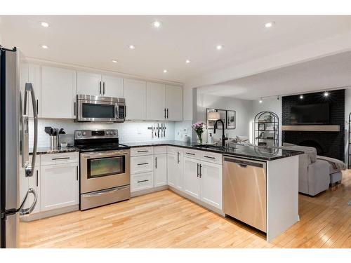 73 Stratford Place Sw, Calgary, AB - Indoor Photo Showing Kitchen With Stainless Steel Kitchen With Upgraded Kitchen