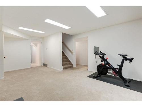 73 Stratford Place Sw, Calgary, AB - Indoor Photo Showing Gym Room