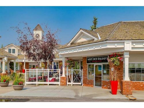 73 Stratford Place Sw, Calgary, AB - Outdoor With Facade