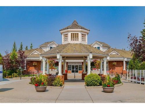 73 Stratford Place Sw, Calgary, AB - Outdoor With Facade