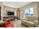 205-200 La Caille Place Sw, Calgary, AB  - Indoor Photo Showing Living Room 