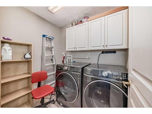 214-59 22 Avenue Sw, Calgary, AB - Indoor Photo Showing Laundry Room