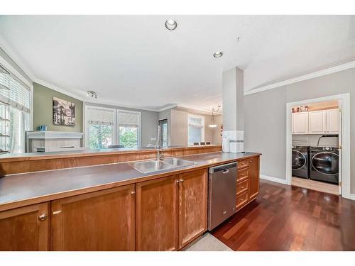 214-59 22 Avenue Sw, Calgary, AB - Indoor Photo Showing Kitchen With Double Sink