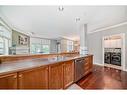 214-59 22 Avenue Sw, Calgary, AB  - Indoor Photo Showing Kitchen With Double Sink 