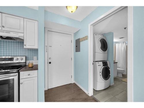 213-2000 Applevillage Court Se, Calgary, AB - Indoor Photo Showing Laundry Room