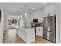 28 B Green Meadow Crescent, Strathmore, AB  - Indoor Photo Showing Kitchen With Upgraded Kitchen 