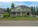 29 Ranch Road, Okotoks, AB  - Outdoor With Deck Patio Veranda With Facade 