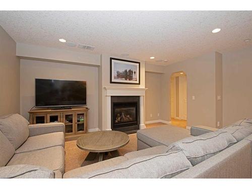 29 Ranch Road, Okotoks, AB - Indoor Photo Showing Living Room With Fireplace