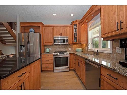 29 Ranch Road, Okotoks, AB - Indoor Photo Showing Kitchen With Stainless Steel Kitchen With Double Sink