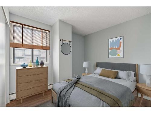 305-111 14 Avenue Se, Calgary, AB - Indoor Photo Showing Bedroom