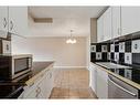 305-111 14 Avenue Se, Calgary, AB  - Indoor Photo Showing Kitchen 