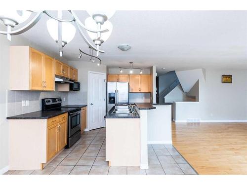 7 Saddlecrest Terrace Ne, Calgary, AB - Indoor Photo Showing Kitchen With Stainless Steel Kitchen