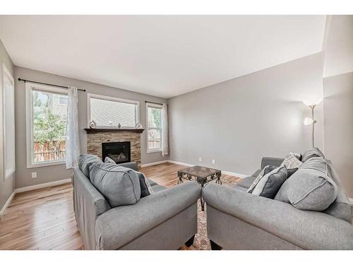 109 Brightonwoods Crescent Se, Calgary, AB - Indoor Photo Showing Living Room With Fireplace