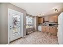 1601-111 Tarawood Lane Ne, Calgary, AB  - Indoor Photo Showing Kitchen With Double Sink 