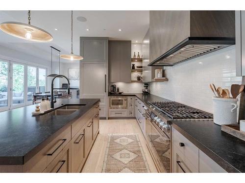 303-3030 17 Street Sw, Calgary, AB - Indoor Photo Showing Kitchen With Double Sink With Upgraded Kitchen