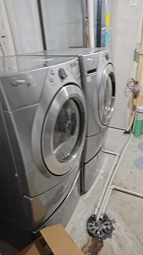 201 Walgrove Boulevard Se, Calgary, AB - Indoor Photo Showing Laundry Room