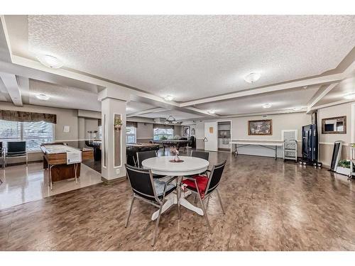 3324-3000 Millrise Point Sw, Calgary, AB - Indoor With Fireplace