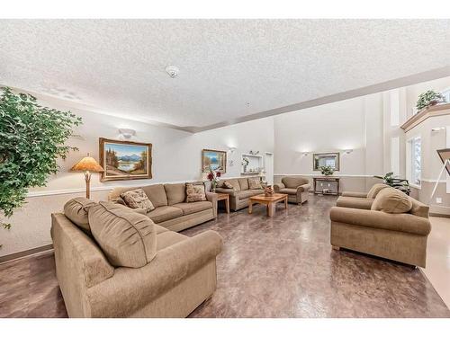 3324-3000 Millrise Point Sw, Calgary, AB - Indoor Photo Showing Living Room