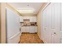 3324-3000 Millrise Point Sw, Calgary, AB  - Indoor Photo Showing Kitchen With Double Sink 