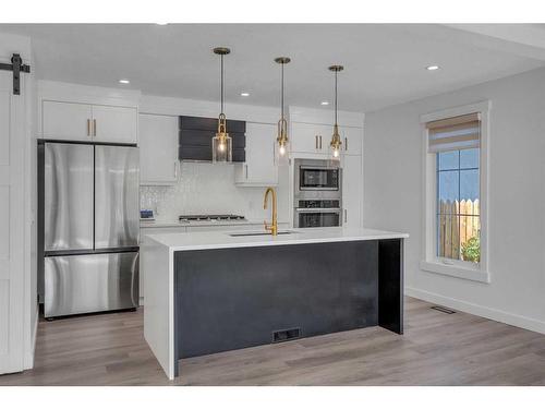 5528 Dalhart Hill Nw, Calgary, AB - Indoor Photo Showing Kitchen With Upgraded Kitchen