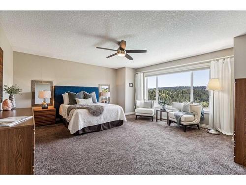 63 Jumping Pound Terrace, Cochrane, AB - Indoor Photo Showing Bedroom