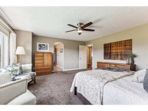 63 Jumping Pound Terrace, Cochrane, AB - Indoor Photo Showing Bedroom