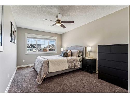 63 Jumping Pound Terrace, Cochrane, AB - Indoor Photo Showing Bedroom