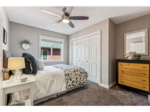 63 Jumping Pound Terrace, Cochrane, AB - Indoor Photo Showing Bedroom